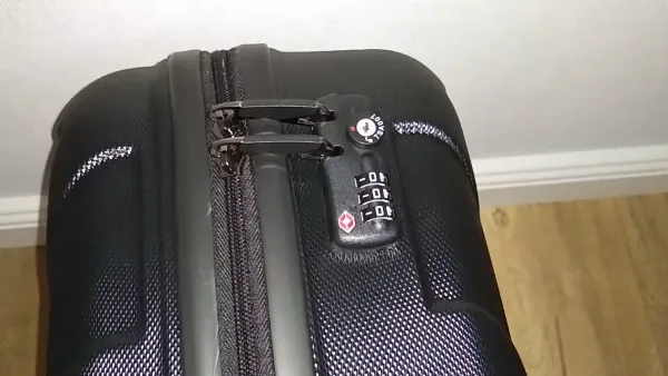 how to unlock a tumi suitcase